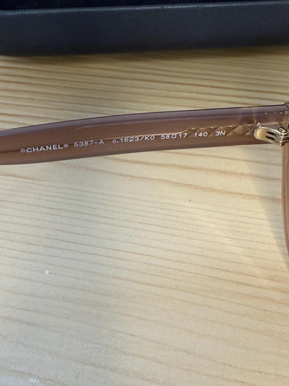 Chanel 5387 oval sunglasses in beige acetate with dark brown gradient lenses